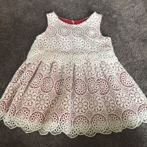 Lace dress with dark red under lay.